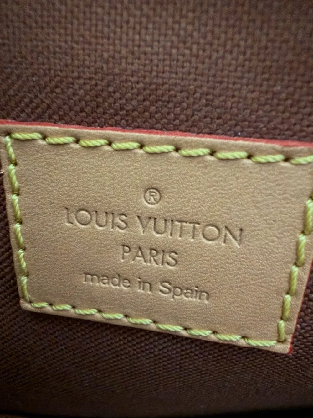 Louis Vuitton Monogram Canvas Backpack with Tan Leather Trim and Pink Charm